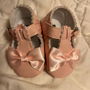 A hint pink baby shoes